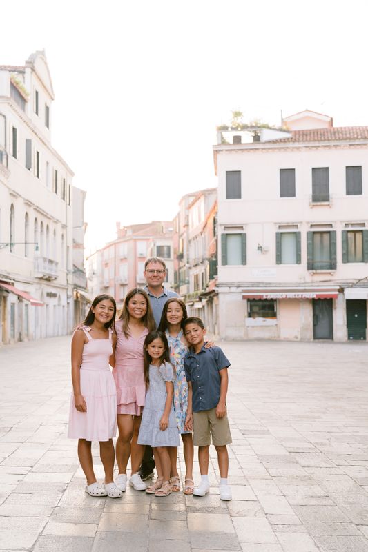 Seng and her family on a street in Venice, Italy
