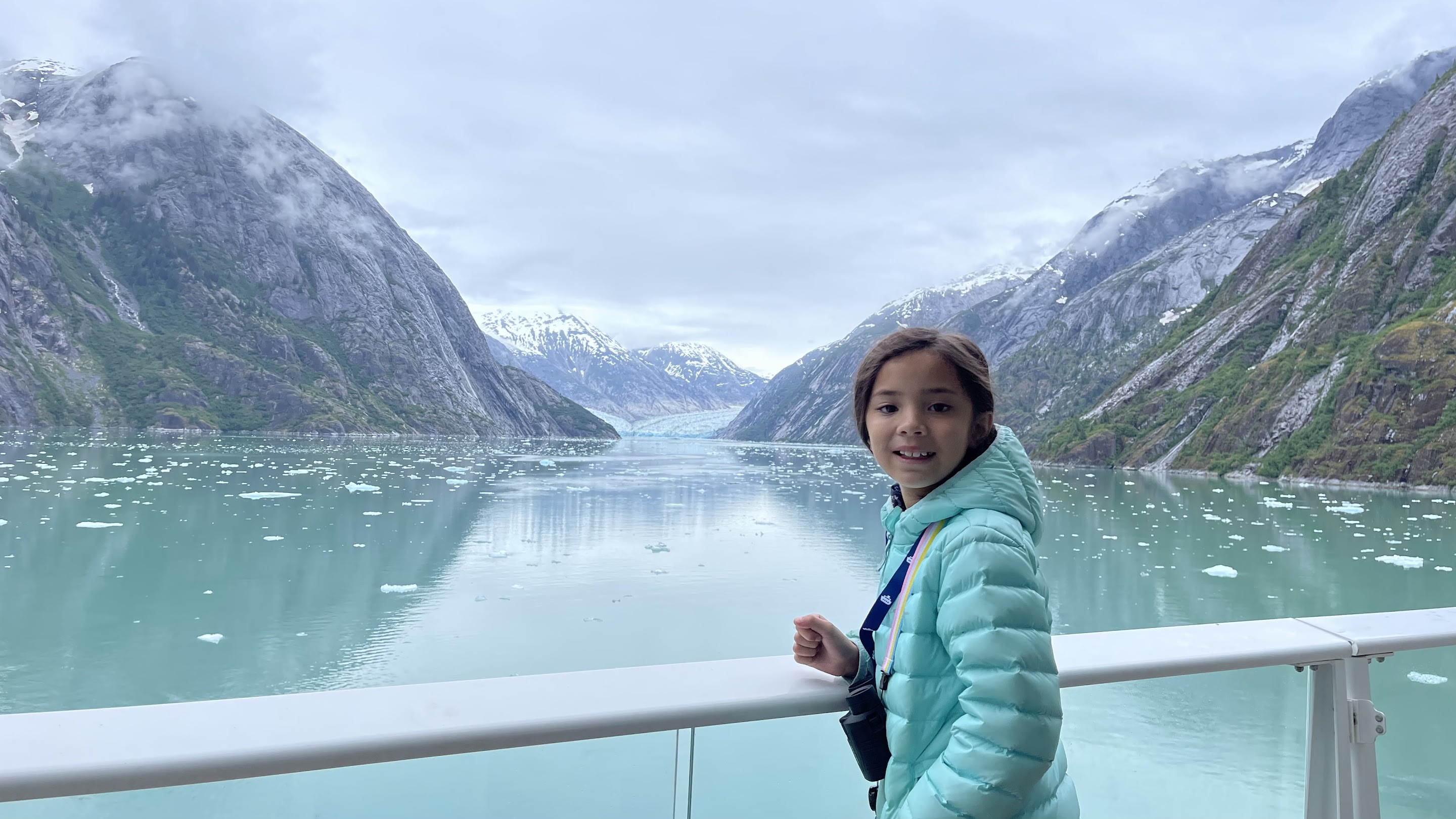 A teal glacial lake with ancient ice